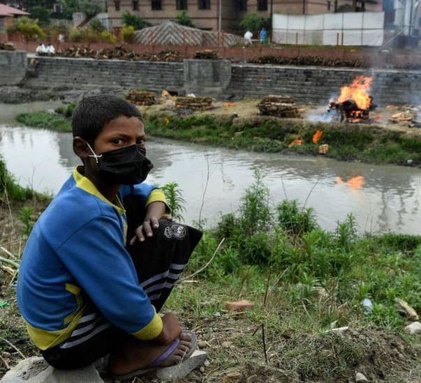 As India halts vaccine exports, Nepal faces its own Covid crisis