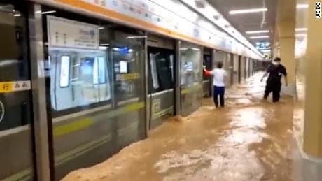 ‘It was hard to breathe’: China flood terror as train carriage submerged