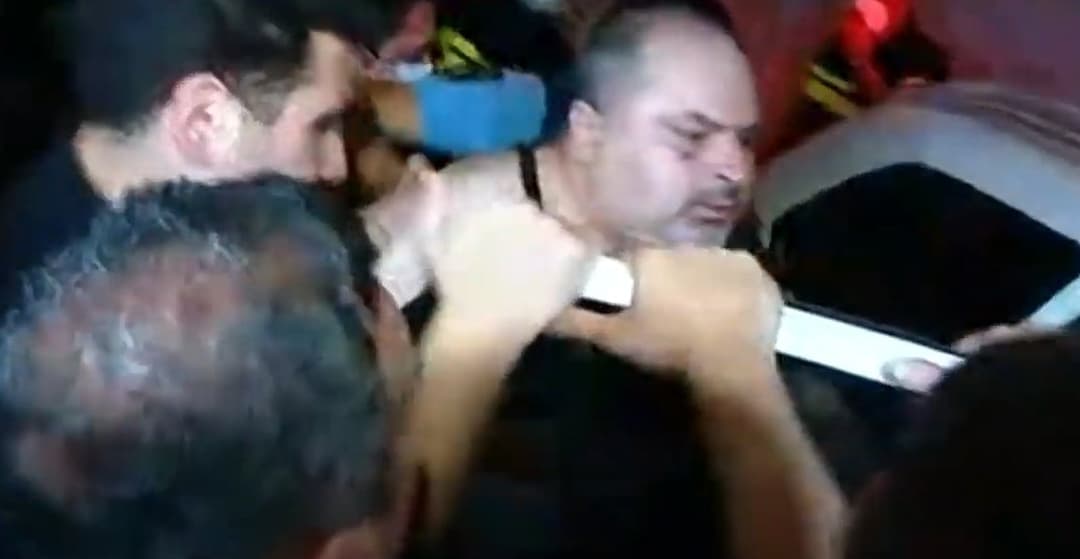 Irakli Absandze, the host of the Georgian 1TV, was detained at a rally in front of the Georgian Dream office