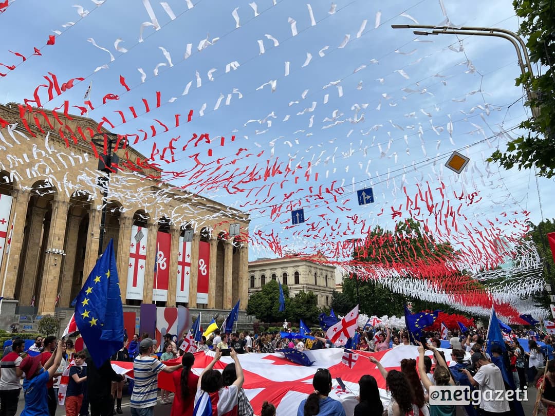 Citizens rally with EU flags in Tbilisi on Independence Day, as decorations lack EU flags
