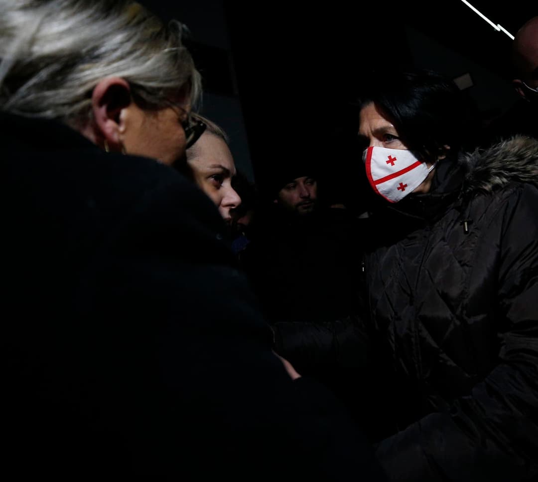Georgian president in airport as bodies of fallen Georgian fighters in Ukraine brought in homeland