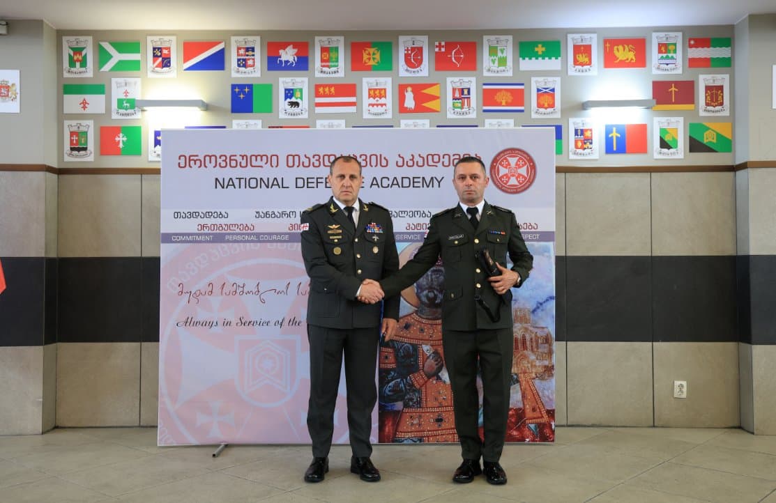 <p style="text-align: justify">ეროვნული თავდაცვის აკადემიაში თავდაცვის ძალების დღისადმი მიძღვნილი ღონისძიება გაიმართა. ღონისძიებაზე აკადემიის რექტორმა, ბრიგადის გენერალმა მამია ბალახაძემ სიტყვით მიმართა აკადემიის პირად შემადგენლობას და თავდაცვის ძალების დღე მიულოცა.</p><p style="text-align: justify">"მსურს მოგილოცოთ თავდაცვის ძალების დღე და მადლობა გადაგიხადოთ სამსახურისთვის. მადლობა მინდა გითხრათ იმ შრომისა და ძალისხმევისთვის, რასაც ჩვენ ყველანი ერთად ვეწევით ჩვენი სამშობლოს უკეთესი მომავლისათვის, მისი გამთლიანებისათვის.</p><p style="text-align: justify">ეროვნული თავდაცვის აკადემიის ხელმძღვანელობა მუდმივად არის ორიენტირებული სიახლეების დანერგვაზე ყველა მიმართულებით და თითოეული თქვენგანისთვის უკეთესი პირობების შექმნაზე.</p><p style="text-align: justify">მინდა მივესალმო ჩვენს დაჭრილ-დაშავებულ სამხედრო მოსამსახურეებს, რომლებმაც საკუთარი ჯანმრთელობა მსხვერპლად გაიღეს სამშობლოს სამსახურში. ქედს ვიხრი დაღუპული სამხედრო მოსამსახურეების ხსოვნის წინაშე და უდიდეს პატივისცემას გამოვხატავ მათი ოჯახების წინაშე.</p><p style="text-align: justify">გისურვებთ წარმატებებს ჩვენი ქვეყნის სამსახურში და კიდევ ერთხელ გილოცავთ თავდაცვის ძალების დღეს!", - განაცხადა ბალახაძემ.</p><p style="text-align: justify">აკადემიის ინსტიტუციონალურ განვითარებაში შეტანილი წვლილისათვის, დაკისრებული მოვალეობის კეთილსინდისიერად და მაღალხარისხოვნად შესრულებისათვის - ორი სამხედრო მოსამსახურე &nbsp;დაჯილდოვდა ცეცხლსასროლი იარაღით, &nbsp;ფასიანი საჩუქარი გადაეცათ ექვს სამხედრო მოსამსახურეს, სტატუეტებით "იუნკერი“ დაჯილდოვდა ორი სამოქალაქო პირი. დაკისრებული მოვალეობის კეთილსინდისიერად და მაღალხარისხოვნად შესრულებისთვის, აკადემიის რექტორის ბრძანებით "საპატიო სიგელი" გადაეცათ ათ სამხედრო მოსამსახურეს.</p>