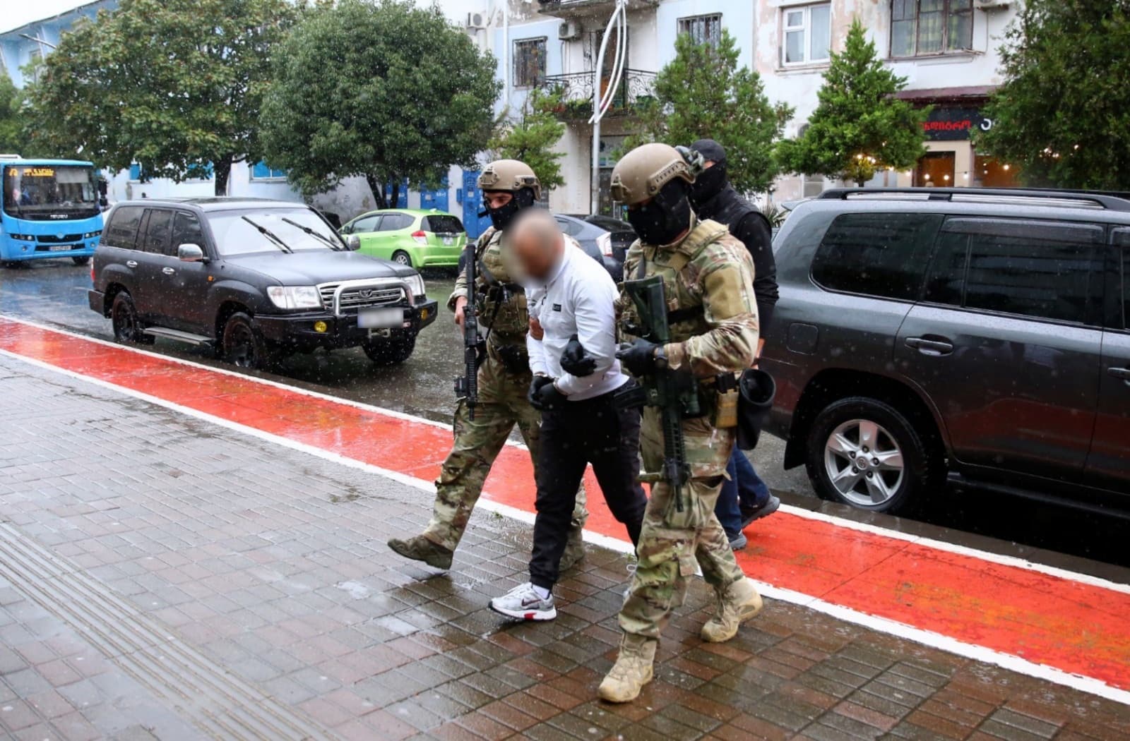 <p><span style="color: rgb(0, 0, 0)">The Counterterrorism Center of the State Security Service (SSS) of Georgia has detained three Georgian citizens in connection with their involvement in a foreign terrorist organization and providing support for terrorist activities, the SSS Deputy Chief Lasha Magradze announced at a briefing on Monday.</span></p><p><span style="color: rgb(0, 0, 0)">Magradze said the investigation revealed that members of the so-called “Takbirist Jamaat”, an extremist group shaped by radical terrorist ideology, had connections with influential foreign leaders of the Islamic State. Acting on judicial orders, the Counterterrorism Center conducted special operations at five separate locations in the Adjara region, resulting in the arrests.</span></p><p><span style="color: rgb(0, 0, 0)">“Based on evidence obtained during operational and investigative activities, certain terrorist activities were identified. Members of the Takbirist Jamaat, under the guidance of influential foreign Islamic State figures, formed a radical-extremist group characterized by extreme aggression toward followers of other religions,” Magradze said.</span></p><p><span style="color: rgb(0, 0, 0)">Authorities reported that the group planned to smuggle foreign Islamic State members into Georgia, establish a base, provide illegal housing and logistical support for affiliates, and use Georgian territory as a transit point for terrorist activities.</span></p><p><span style="color: rgb(0, 0, 0)">During early-morning investigative actions, officers seized items displaying terrorist symbols, explosives, large quantities of ammunition, firearms, military equipment, mobile phones, electronic storage devices, significant sums of various currencies, and other evidence relevant to the investigation.</span></p><p><span style="color: rgb(0, 0, 0)">The probe is being conducted under Articles 236 and 328 of the Georgian Criminal Code, covering the illegal acquisition and storage of firearms, ammunition, explosives, membership in a foreign terrorist organization, and assistance in terrorist activities. Convictions under these articles carry a maximum sentence of 17 years imprisonment.</span></p><p><br></p>