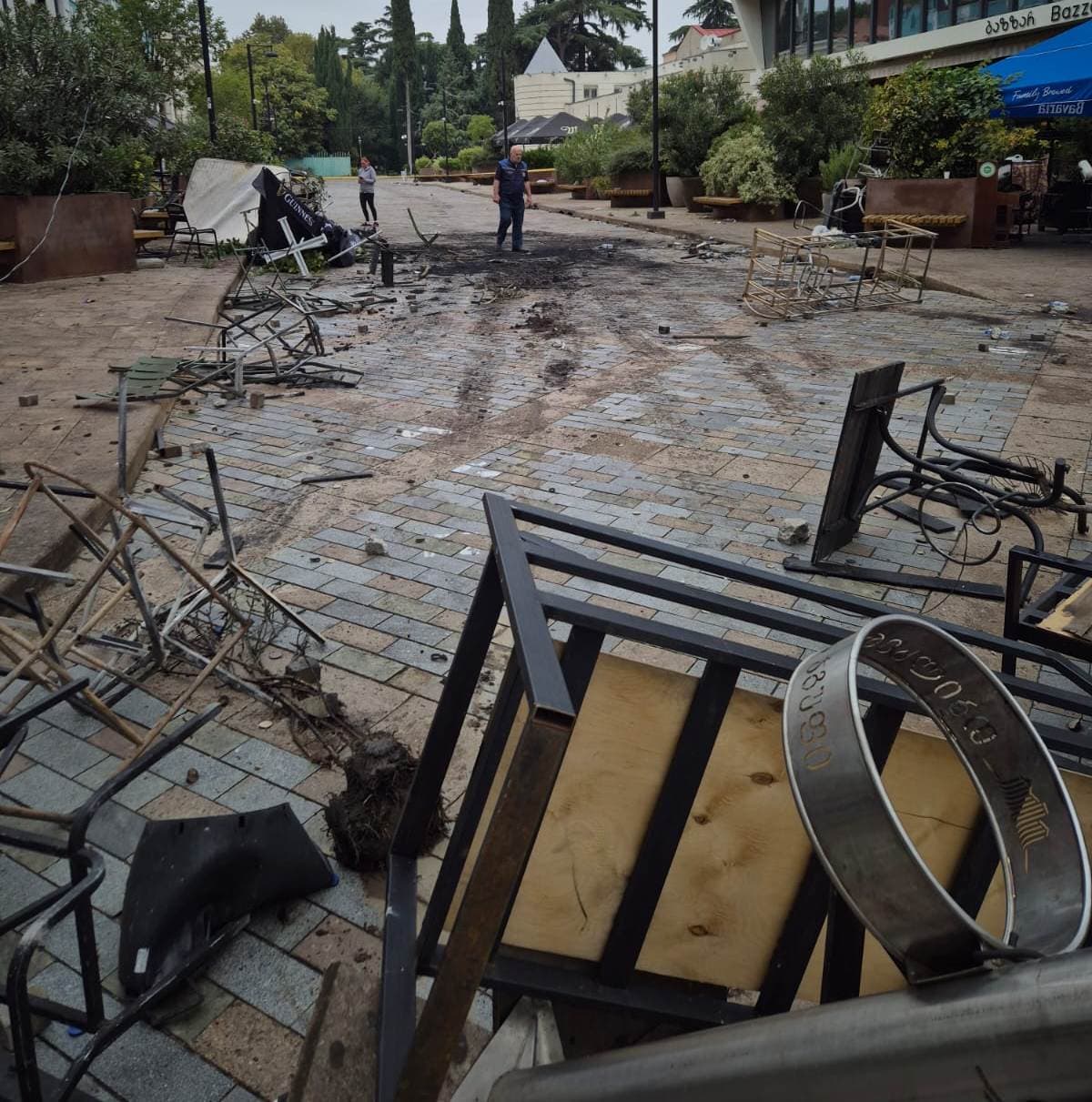 <p style="text-align: justify">The Tbilisi City Hall on Sunday released a statement and photo-video materials detailing damage caused to municipal infrastructure and public property during last night’s protests in the capital.</p><p style="text-align: justify">According to the statement, the protests resulted in harm to several cultural heritage sites and city infrastructure, including facades, decorative lighting, and public amenities in central areas.</p><p style="text-align: justify">“Unfortunately, the protests have caused damage to cultural heritage facades, shutters, and parts of artistic decorative lighting installations. On Orbeliani and Tabukashvili Streets and Rustaveli Avenue, pedestrian pavements, cobblestones, streetlight fixtures, and cables were damaged. Decorative lights on Orbeliani Street were torn down and broken, while waste containers on Tabukashvili Street were burned,” the statement said.</p><p style="text-align: justify">City Hall added that street furniture owned by private companies and café operators was also destroyed. The fence surrounding the Presidential Administration’s courtyard was broken, and nearby bollards separating pedestrian and vehicle zones were bent or damaged.</p><p style="text-align: justify">Various other public elements - including swings, plants, flowerpots, and decorative landscaping - were also heavily damaged, with some completely destroyed. Road signs, a barrier gate near the underground parking area, display boards, and a decorative stage above the parking site were reported broken.</p><p style="text-align: justify">Tbilservice Group, the city’s waste and maintenance service, began clean-up work after gaining access to the area. Burnt and broken materials were removed, and the affected locations were cleaned and organised.</p><p style="text-align: justify">“At this stage, municipal departments are working on-site to restore the damaged infrastructure and return the area to its original condition,” the statement concluded.</p>