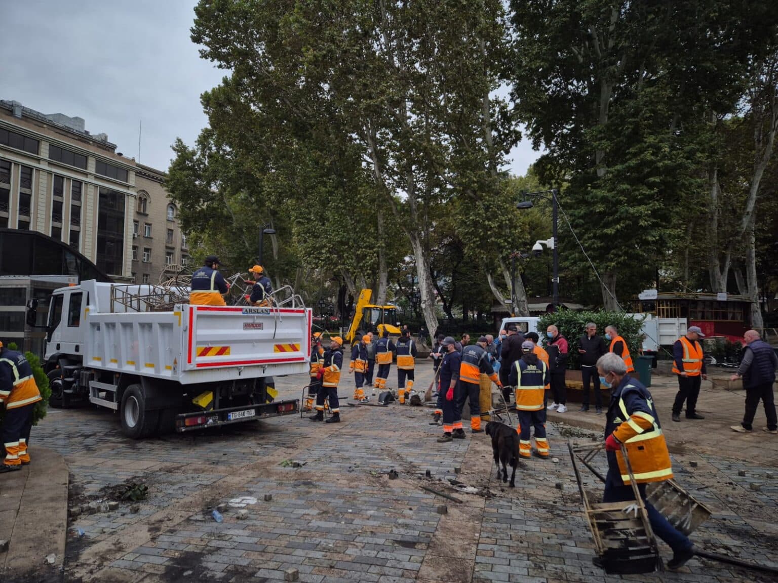 <p style="text-align: justify">The Tbilisi City Hall on Sunday released a statement and photo-video materials detailing damage caused to municipal infrastructure and public property during last night’s protests in the capital.</p><p style="text-align: justify">According to the statement, the protests resulted in harm to several cultural heritage sites and city infrastructure, including facades, decorative lighting, and public amenities in central areas.</p><p style="text-align: justify">“Unfortunately, the protests have caused damage to cultural heritage facades, shutters, and parts of artistic decorative lighting installations. On Orbeliani and Tabukashvili Streets and Rustaveli Avenue, pedestrian pavements, cobblestones, streetlight fixtures, and cables were damaged. Decorative lights on Orbeliani Street were torn down and broken, while waste containers on Tabukashvili Street were burned,” the statement said.</p><p style="text-align: justify">City Hall added that street furniture owned by private companies and café operators was also destroyed. The fence surrounding the Presidential Administration’s courtyard was broken, and nearby bollards separating pedestrian and vehicle zones were bent or damaged.</p><p style="text-align: justify">Various other public elements - including swings, plants, flowerpots, and decorative landscaping - were also heavily damaged, with some completely destroyed. Road signs, a barrier gate near the underground parking area, display boards, and a decorative stage above the parking site were reported broken.</p><p style="text-align: justify">Tbilservice Group, the city’s waste and maintenance service, began clean-up work after gaining access to the area. Burnt and broken materials were removed, and the affected locations were cleaned and organised.</p><p style="text-align: justify">“At this stage, municipal departments are working on-site to restore the damaged infrastructure and return the area to its original condition,” the statement concluded.</p>