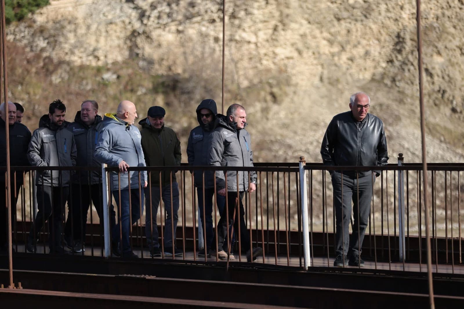 <p style="text-align: justify">Work has begun on a project to rehabilitate the historic suspension bridge over the Magana River in the town of Jvari, in Georgia’s northwestern Tsalenjikha Municipality, and develop it into a tourist attraction.</p><p style="text-align: justify">The initiative is being led by the Ministry of Infrastructure of Georgia, which plans to restore the structure and integrate it into the region’s tourism offering.</p><p style="text-align: justify">The 80-metre pedestrian bridge, built in 1931–1932, is currently damaged. It has been granted the status of a cultural heritage monument.</p><p style="text-align: justify">Infrastructure Minister Revaz Sokhadze inspected the site together with Municipal Development Fund Executive Director Beka Urushadze, Roads Department Chair Levan Darakhvelidze, Member of Parliament Ilia Injia, representatives of the local government, and Enguri Attraction Director Nikoloz Antidze.</p><p style="text-align: justify">Officials reviewed the current condition of the bridge and discussed plans for its rehabilitation and future tourism use.</p>