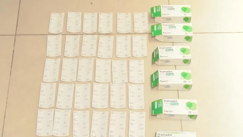 During an inspection of his carry-on luggage, law enforcement officers seized 420 narcotic pills as evidence